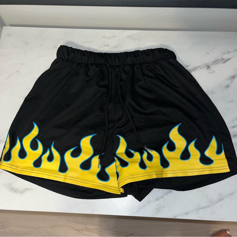 Black shorts with fire deisgn